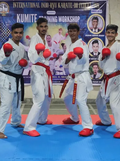 Posing with some of my senior students and fellow instructors. We lead by example, showing that teamwork and mutual respect are the foundation of a strong dojo.