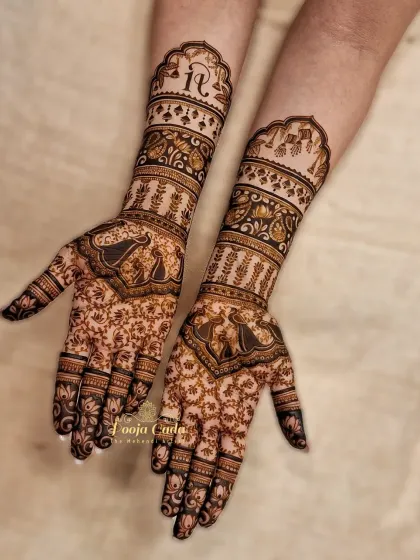 An elegant design featuring peacocks and floral jaal work, with the couple's initials personalized at the top.
