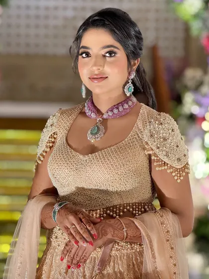 A classic portrait of the bride, her makeup looking clean and precise, enhancing her natural beauty.