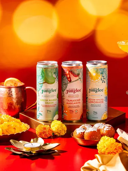 Another angle of a festive Diwali-themed shoot, showing a different composition with beautiful bokeh lights in the background.