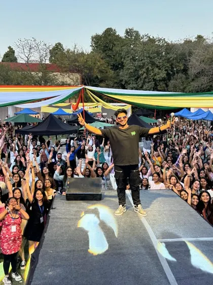 The peace signs say it all. A fantastic shot with the entire crowd at a Delhi University fest, all of us sharing a moment of pure musical joy.