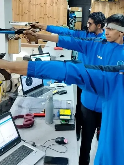 Precision in practice. My shooters train with modern air pistols, and each lane is equipped with a laptop displaying real-time results from our electronic target systems, allowing for instant feedback and analysis.