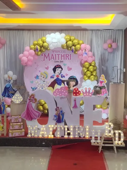 A full view of the Disney Princess themed birthday stage, with a red carpet leading up to the main display.