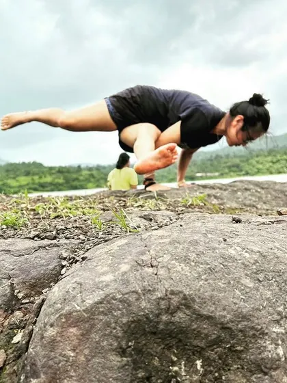 Anytime, anywhere arm balancing is a must. A flying pigeon pose on the rocks during a trek, connecting my practice with the raw energy of nature.