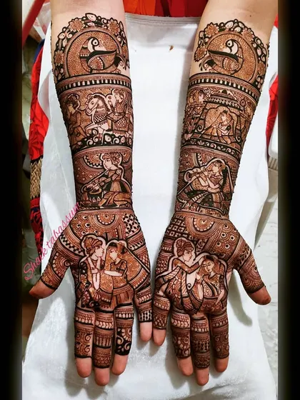 A multi-scened narrative mehendi, this design captures various moments from the wedding festivities. From dancing figures to ceremonial scenes, it's a celebration in henna.