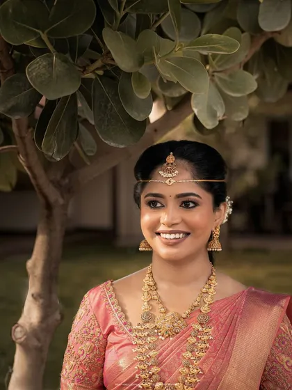 A beautiful, happy portrait of the bride, Nisarga. Her bright smile is infectious, and the natural outdoor lighting makes her glow.