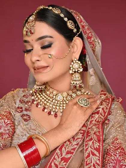 This side profile highlights the beautiful hair bun and the way the matha patti is styled, showing that my students learn to consider the entire look.