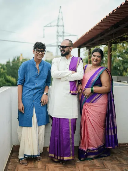 A family that celebrates together, should shine together. I designed these coordinated outfits for my wedding day, a custom pink and purple saree look for me, and matching traditional wear for my husband and son. I create bespoke outfits for the entire family for any occasion.