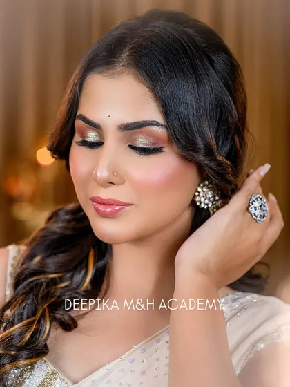 Another close-up with eyes closed, showing the detail of the glittery eyeshadow. This is a great example of a glamorous party eye makeup look.