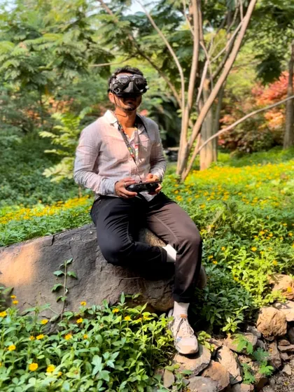 Finding a moment of peace in nature before a flight. The FPV goggles and controller are my portal to another world.