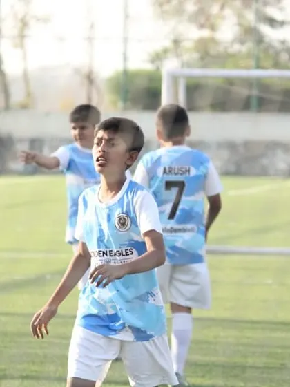 A player calls for the ball during a Blue Cubs league match. We encourage communication and awareness on the field.