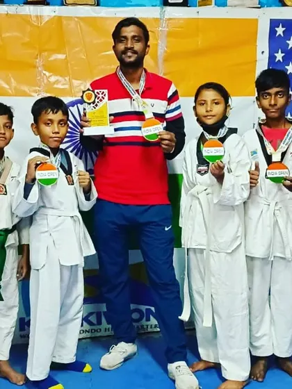 My students and I with our medals and trophy from an open national tournament.