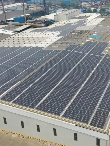 This image shows another angle of the extensive solar panel array on the Coca-Cola facility roof. Our engineering team carefully plans each layout to account for roof obstacles and optimize sun exposure throughout the day.