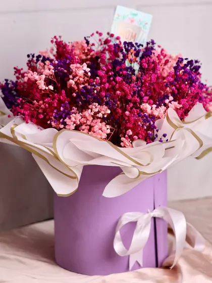 The full view of our Mother's Day surprise box, featuring a stunning bouquet of preserved baby's breath flowers that last up to a year.