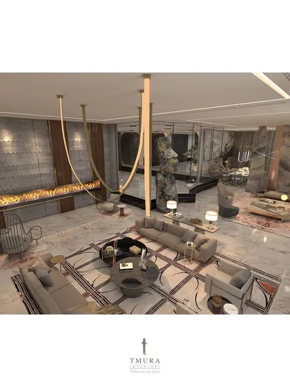 An overhead view of the same grand living space, showing the thoughtful furniture layout. Sofas are arranged to create distinct conversation areas, all oriented towards features like the long fireplace or the central sculpture.