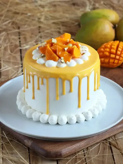 Our Mango Overloaded Cake truly lives up to its name. With a rich mango drip and a pile of fresh mango chunks on top, it's a dream come true for any mango lover.