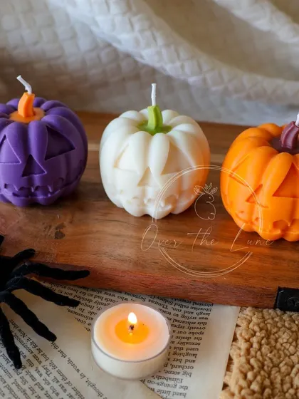 My jack-o'-lantern candles are a Halloween classic. I make them in spooky purple, classic orange, and even a ghostly white.