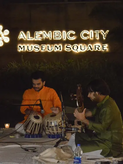 A shot of our performance at the Alembic City Museum Square. Performing outdoors at night, surrounded by candles, adds a special, serene quality to the music.