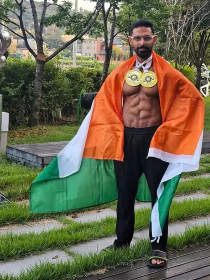 Proudly representing India after winning two gold medals. This victory was for my country, my family, and every client who trusts me with their health.