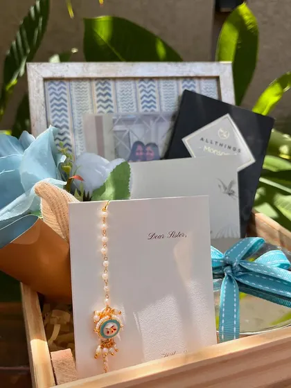 A close-up of the cute character Rakhi included in our special sister hamper.