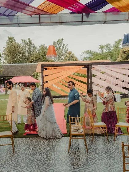Candid moments from the carnival event, with guests enjoying the lively and colorful surroundings.