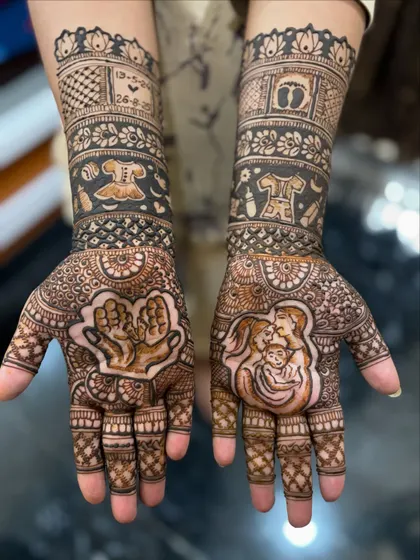 Mehendi is for all happy occasions. This special baby shower design includes a portrait of the family, tiny baby feet, and other cute motifs to celebrate the mom-to-be.