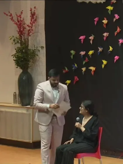 A moment from my TEDx talk, demonstrating a mentalism principle with an audience member.