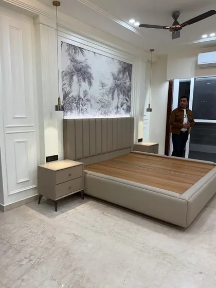 This view shows the classic molding on the wall, which adds a touch of sophistication to the modern design.