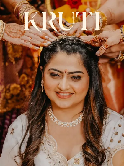 The women of the family place their hands on the bride's head in a gesture of blessing. This is a powerful, traditional moment that I am always honored to capture.