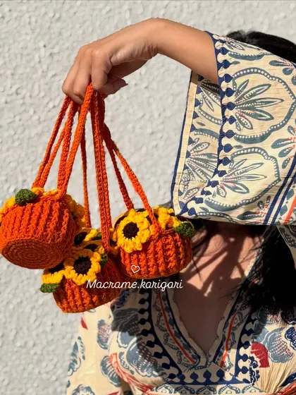 A collection of our hanging sunflower pot car charms. These cheerful decorations bring a touch of sunshine and boho style to your vehicle's interior.