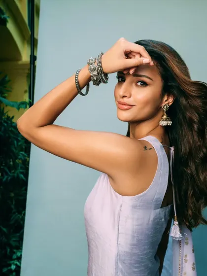 A close-up of Tripti, showing the delicate details of the Masaba kurta and the simple, elegant jewelry we paired with it.