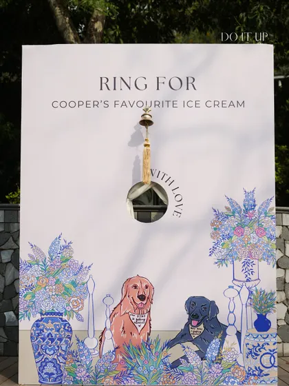 A fun and personal detail. We included a 'Ring for Cooper's Favourite Ice Cream' station, a sweet nod to the couple's beloved pet, with custom illustrated artwork.