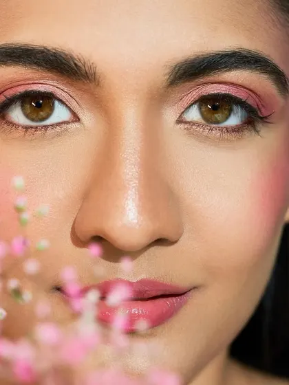 My student Shraddha created this ethereal look with delicate, hand-painted flowers. It's a beautiful example of combining makeup with fine art.