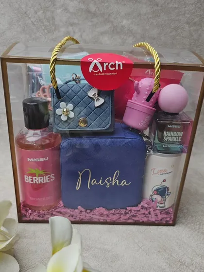 A cute and vibrant hamper designed for a sister. This gift set features a personalized jewelry box and mug, along with a curated selection of fun accessories and treats.