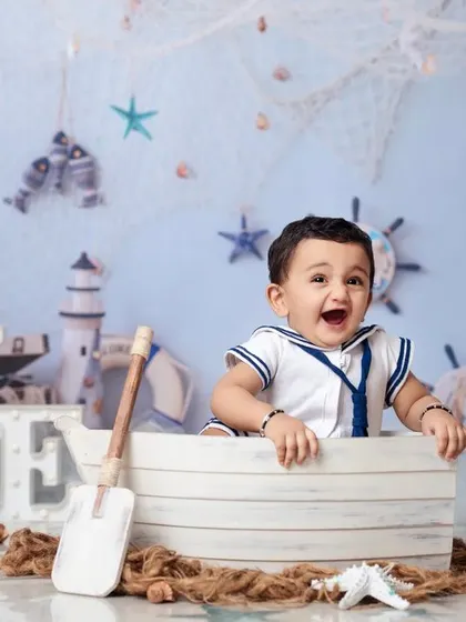 A huge, happy laugh from our little sailor. These are the moments we live to capture.