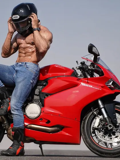 When you're trying to remember what you forgot at the refuel station. A humorous take on the biker lifestyle, combined with a top-tier physique.