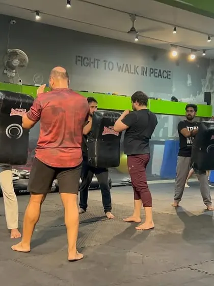 In my gym, you are your only competition. Students work in pairs on the kick shields, pushing each other to strike harder, move faster, and be better than they were yesterday.