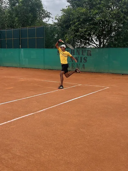 A player executes a running forehand, a drill that combines speed, timing, and precise racket control.