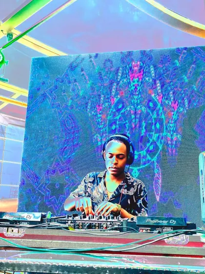 Performing with a backdrop of psychedelic visuals. My techno sets are often paired with immersive lighting and visuals to create a complete sensory experience.