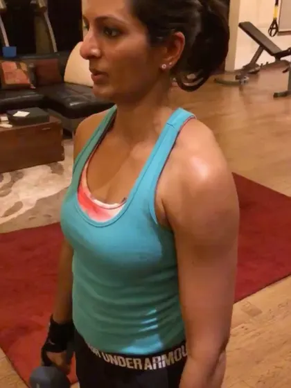 A close-up showing the muscle definition that comes from consistent strength training. This client's hard work is clearly paying off.