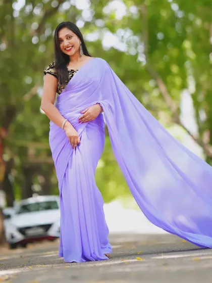 A full-length view of the lavender trail saree, highlighting its elegant simplicity.