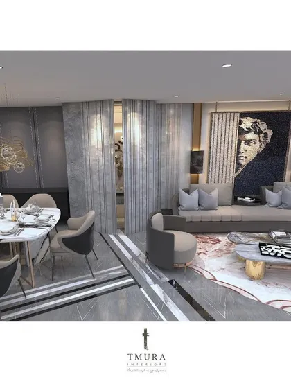 This image shows the relationship between the dining and living areas. A sheer curtain can be drawn to create separation, offering flexibility for both large parties and more intimate family dinners.