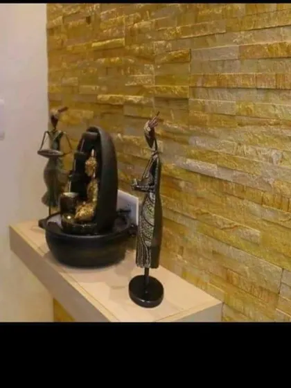 Your green escape can be indoors too. I created this tranquil Zen corner using a stacked stone feature wall and a tabletop water fountain. This small space now brings a sense of calm and nature inside, proving you don't need a large area to create a peaceful retreat.
