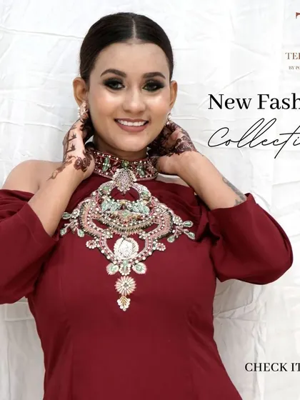 Our new fashion collection features stunning pieces like this maroon gown. It's designed to make you the center of attention at any festive event.