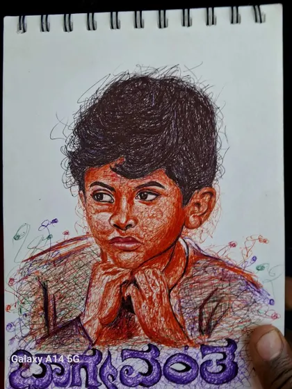 A close-up of my scribble art portrait of a young Puneeth Rajkumar from the movie "Bhagyavantha". This style uses chaotic lines to create a surprisingly detailed and emotional image.