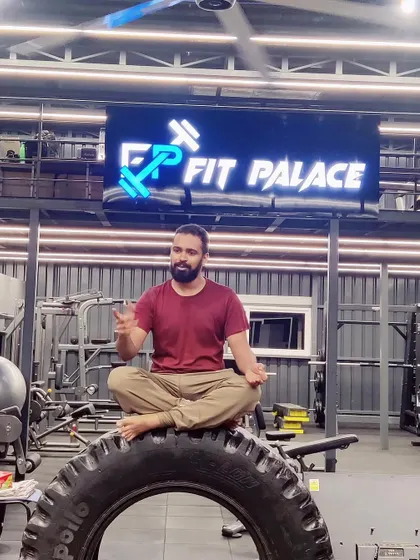 A candid shot during a moment of instruction or conversation while in a meditative pose.