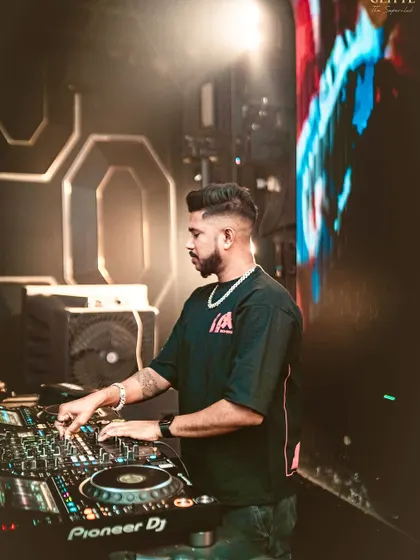 A close-up of me working the Pioneer DJ console at Glitte. This highlights the technical skill and precision that goes into every mix.