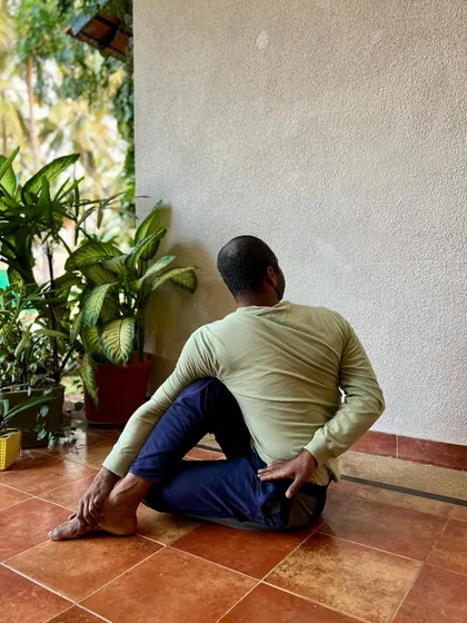 This series shows the preparatory poses for Yoga Dandasana, including variations of Ardha Matsyendrasana, Eka Pada Rajakapotasana, and Baddha Virabhadrasana. It highlights the importance of preparing the body with twists and hip openers.