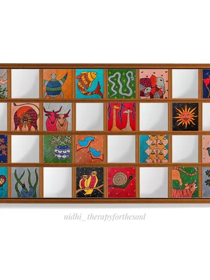 This is a digital mockup showing how a custom set of 20 Gond art tiles with embroidery could look as a large wall installation. This project for a client in the USA was inspired by Egyptian wall art, blending cultures and styles.