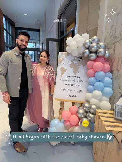 It all began with the cutest baby shower for this couple. This photo shows them at their travel-themed shower, just before their journey into parenthood began.